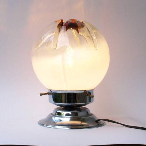 Toni Zuccheri |Due lampade in metallo cromato |diffusore in vetro con sfumature di opalino e giallo con sagomatura irregolare
