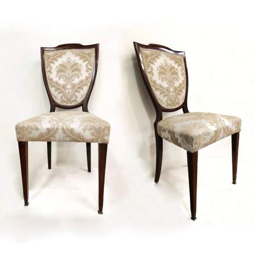 Set di due sedie | legno di noce e tappezzeria | h cm. 95x46x43 – seduta 48 | anno 1935